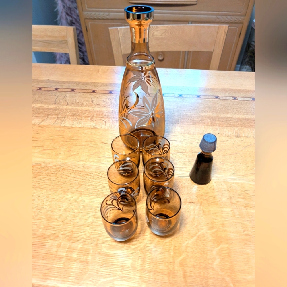 MCM liquor Decanter With White/Gold Floral Motif.